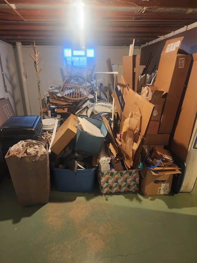 Roll-off dumpster container at job site for Construction Dumpster Rental in Waupaca